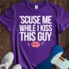 Scuse Me While I Kiss This Guy... Unisex Cotton Tee