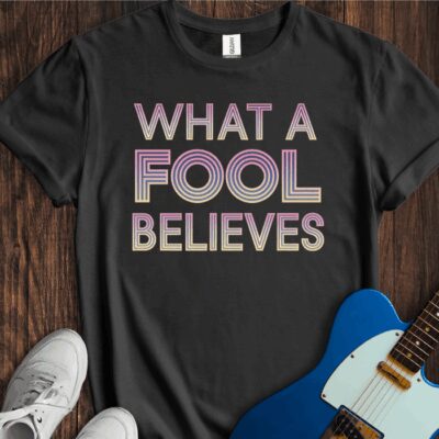 What A Fool Believes Unisex Cotton Tee
